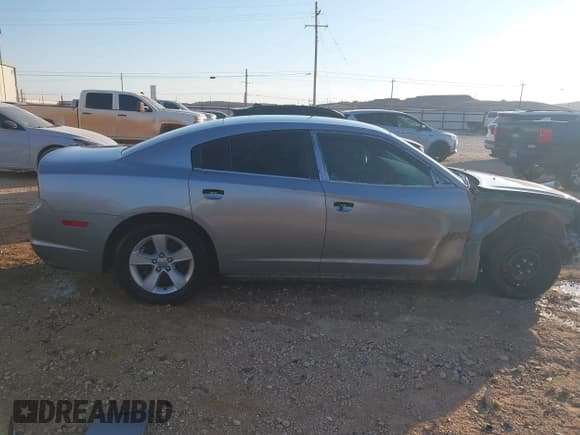 ✅ 2013 Dodge Charger SE • VIN: 2C3CDXBG6DH701961 • Lot: 43355152. Listed on IAAI with 113,746 mi. Free auction sales archive from the USA and detailed vehicle history report at DreamBid. Image 14.