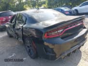 ✅ 2019 Dodge Charger R/T • VIN: 2C3CDXCT8KH584134 • Lot: 42664664. Listed on IAAI with 105,547 mi. Free auction sales archive from the USA and detailed vehicle history report at DreamBid. Image 3.