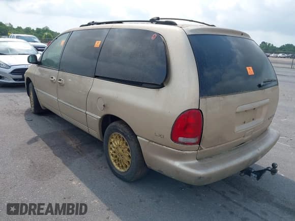 ✅ 1998 Chrysler Town & Country LXi • VIN: 1C4GP64L3WB649953 • Lot: 40083104. Wystawiony na IAAI z przebiegiem Nie podano. Bezpłatny archiwum sprzedaży aukcyjnych z USA i szczegółowy raport historii pojazdu na DreamBid. Zdjęcie 3.