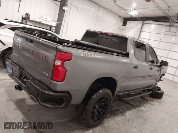 ✅ 2021 Chevrolet Silverado 1500 LT Trail Boss • VIN: 1GCPYFEL2MZ261063 • Лот: 43743393. Опубликован ранее на IAAI с пробегом 76 396 миль. Бесплатный доступ к архиву аукционных продаж из США и подробный отчёт об истории автомобиля на DreamBid. Изображение 13.