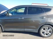 ✅ 2013 Hyundai Santa Fe Sport • VIN: 5XYZW3LA5DG040716 • Lot: 43681898. Listed on IAAI with 214,736 mi. Free auction sales archive from the USA and detailed vehicle history report at DreamBid. Image 14.