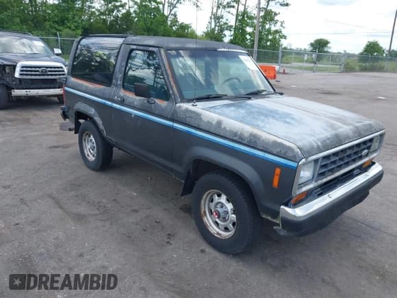 ✅ 1988 Ford Bronco • VIN: 1FMCU14T2JUE07092 • Lot: 42368100. Listed on IAAI with 157,254 mi. Free auction sales archive from the USA and detailed vehicle history report at DreamBid. Image 1.