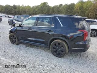 ✅ 2023 Hyundai Palisade XRT • VIN: KM8R34GE4PU518747 • Лот: 78570294. Опубликован ранее на Copart с пробегом 50 899 миль. Бесплатный доступ к архиву аукционных продаж из США и подробный отчёт об истории автомобиля на DreamBid. Изображение 2.