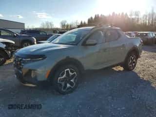 2023 Hyundai Santa Cruz Limited z VIN 5NTJEDAF1PH042322, wystawiony jako Copart lot #79670634 z przebiegiem 21 478 mil mil oraz Czysty tytuł • Clean title. Historia ofert i sprzedaży dostępna na DreamBid. Obrazek 1.