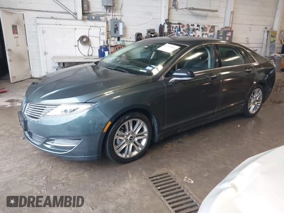 ✅ 2015 Lincoln MKZ Hybrid • VIN: 3LN6L2LU3FR620664 • Lot: 42362854. Wystawiony na IAAI z przebiegiem 152 750 mil. Bezpłatny archiwum sprzedaży aukcyjnych z USA i szczegółowy raport historii pojazdu na DreamBid. Zdjęcie 2.