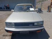 ✅ 1986 Nissan Maxima • VIN: JN1HU11S5GT145169 • Лот: 42472765. Опубликован ранее на IAAI с пробегом 173 183 миль. Бесплатный доступ к архиву аукционных продаж из США и подробный отчёт об истории автомобиля на DreamBid. Изображение 6.