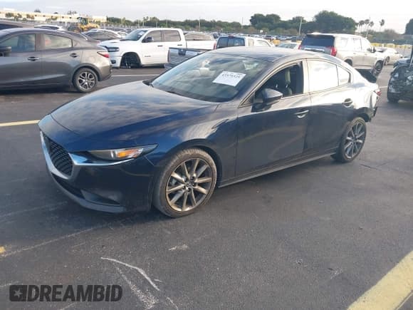 ✅ 2020 Mazda 3 Select • VIN: 3MZBPACL3LM122981 • Lot: 43579325. Listed on IAAI with 40,588 mi. Free auction sales archive from the USA and detailed vehicle history report at DreamBid. Image 2.
