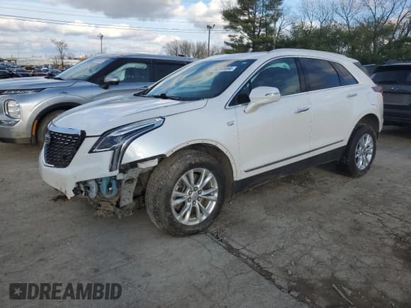 ✅ 2021 Cadillac XT5 AWD Luxury • VIN: 1GYKNBR42MZ142048 • Лот: 86260694. Опубликован ранее на Copart с пробегом 86 744 миль. Бесплатный доступ к архиву аукционных продаж из США и подробный отчёт об истории автомобиля на DreamBid. Изображение 1.
