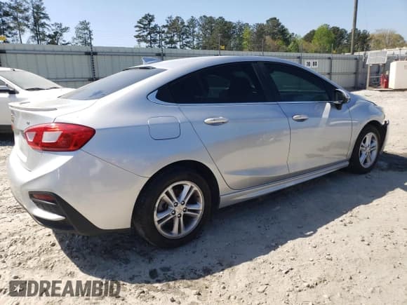 ✅ 2017 Chevrolet Cruze LT • VIN: 1G1BE5SM4H7263157 • Lot: 46839503. Listed on Copart with 90,330 mi. Free auction sales archive from the USA and detailed vehicle history report at DreamBid. Image 3.