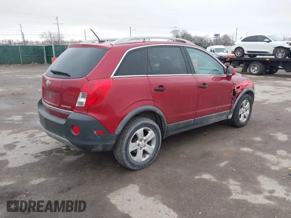 ✅ 2013 Chevrolet Captiva Sport LS • VIN: 3GNAL2EK8DS598538 • Lot: 41464085. Wystawiony na IAAI z przebiegiem 200 865 mil. Bezpłatny archiwum sprzedaży aukcyjnych z USA i szczegółowy raport historii pojazdu na DreamBid. Zdjęcie 4.