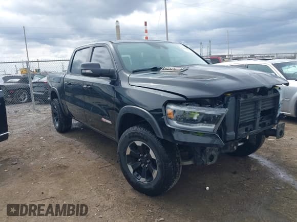 ✅ 2021 Ram 1500 Rebel • VIN: 1C6SRFLT2MN594758 • Lot: 41854893. Listed on IAAI with 54,012 mi. Free auction sales archive from the USA and detailed vehicle history report at DreamBid. Image 1.