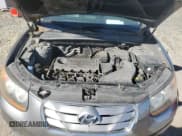 ✅ 2011 Hyundai Santa Fe Limited • VIN: 5XYZK3AB3BG044073 • Lot: 77100334. Listed on Copart with 216,892 mi. Free auction sales archive from the USA and detailed vehicle history report at DreamBid. Image 12.