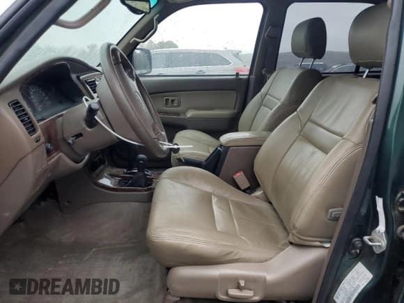 ✅ 1999 Toyota 4Runner Limited • VIN: JT3HN87R1X0200665 • Lot: 90686625. Listed on Copart with 198,982 mi. Free auction sales archive from the USA and detailed vehicle history report at DreamBid. Image 7.