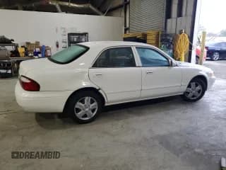 ✅ 2000 Mazda 626 LX • VIN: 1YVGF22D2Y5153254 • Лот: 82841504. Опубликован ранее на Copart с пробегом 88 518 миль. Бесплатный доступ к архиву аукционных продаж из США и подробный отчёт об истории автомобиля на DreamBid. Изображение 3.