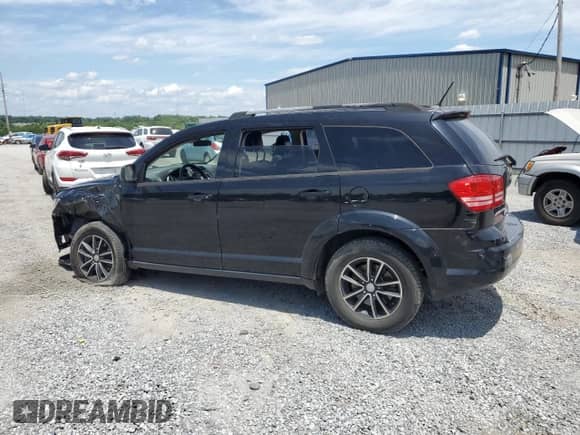 2017 Dodge Journey SE with VIN 3C4PDCAB8HT606195, listed as a Copart auction lot 60147455 with 125,120 mi miles and Salvage title. Bid and sale history available at DreamBid. Image 2.