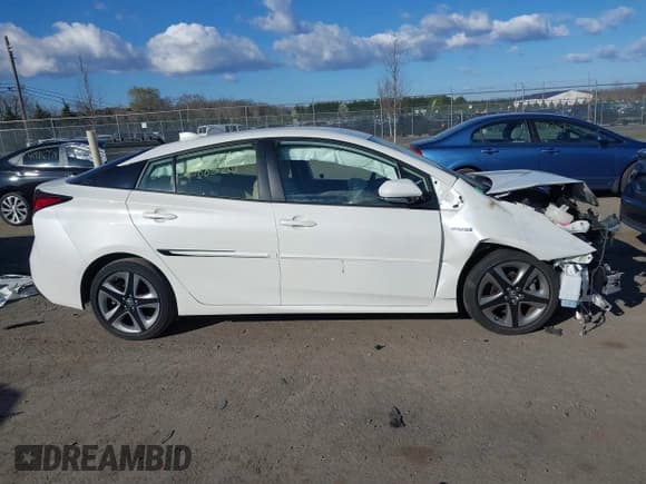 ✅ 2019 Toyota Prius L Eco • VIN: JTDKARFU4K3094244 • Lot: 41888520. Listed on IAAI with 14,082 mi. Free auction sales archive from the USA and detailed vehicle history report at DreamBid. Image 13.