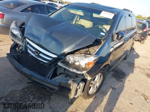✅ 2005 Honda Odyssey EX-L • VIN: 5FNRL38765B117138 • Lot: 42970831. Listed on IAAI with 269,676 mi. Free auction sales archive from the USA and detailed vehicle history report at DreamBid. Image 2.