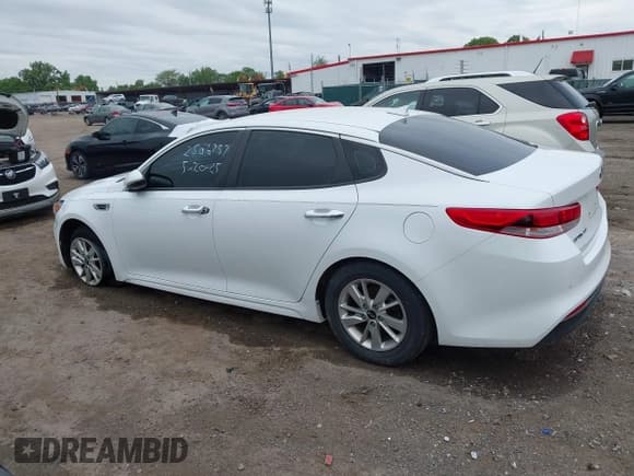 ✅ 2018 Kia Optima S • VIN: 5XXGT4L38JG184817 • Lot: 42317810. Listed on IAAI with 98,734 mi. Free auction sales archive from the USA and detailed vehicle history report at DreamBid. Image 13.