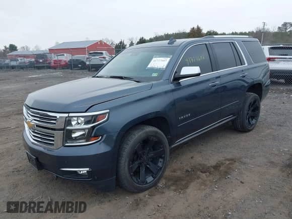 2020 Chevrolet Tahoe Premier z VIN 1GNSKCKJ6LR179033, wystawiony jako IAAI lot #41727607 z przebiegiem 26 879 mil mil oraz . Historia ofert i sprzedaży dostępna na DreamBid. Obrazek 2.