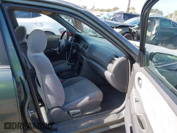 ✅ 1998 Mazda 626 DX • VIN: 1YVGF22C2W5691764 • Lot: 43677590. Wystawiony na IAAI z przebiegiem 142 191 mil. Bezpłatny archiwum sprzedaży aukcyjnych z USA i szczegółowy raport historii pojazdu na DreamBid. Zdjęcie 5.