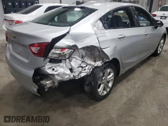 ✅ 2019 Chevrolet Cruze LS • VIN: 1G1BC5SM4K7130525 • Lot: 72665842. Listed on Copart with 56,527 mi. Free auction sales archive from the USA and detailed vehicle history report at DreamBid. Image 3.