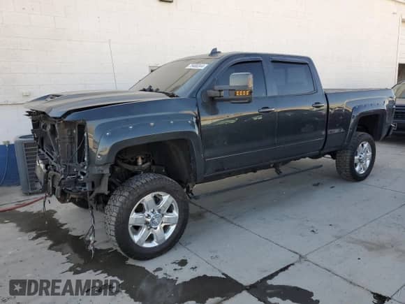 2018 Chevrolet Silverado 3500HD High Country с VIN 1GC4K1EY8JF189768, выставлен на аукционе Copart как лот 75400344 с пробегом 96 450 миль миль и Списание • Salvage title. История ставок и продаж доступна на DreamBid. Изображение 1.