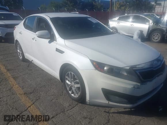 ✅ 2013 Kia Optima LX • VIN: KNAGM4A74D5403586 • Lot: 43658195. Listed on IAAI with 222,104 mi. Free auction sales archive from the USA and detailed vehicle history report at DreamBid. Image 1.