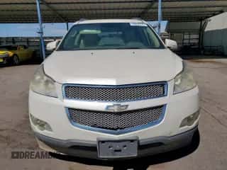 2012 Chevrolet Traverse LTZ z VIN 1GNKRLEDXCJ399291, wystawiony jako Copart lot #70835775 z przebiegiem 167 492 mil mil oraz Szkoda całkowita • Salvage title. Historia ofert i sprzedaży dostępna na DreamBid. Obrazek 5.