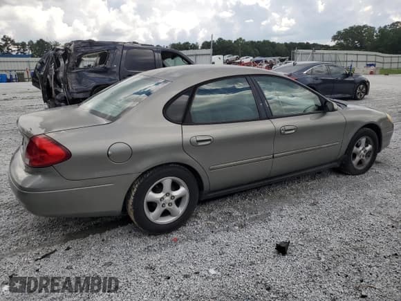 ✅ 2001 Ford Taurus SE • VIN: 1FAFP53U41G104796 • Лот: 69733725. Опубликован ранее на Copart с пробегом 163 204 миль. Бесплатный доступ к архиву аукционных продаж из США и подробный отчёт об истории автомобиля на DreamBid. Изображение 3.