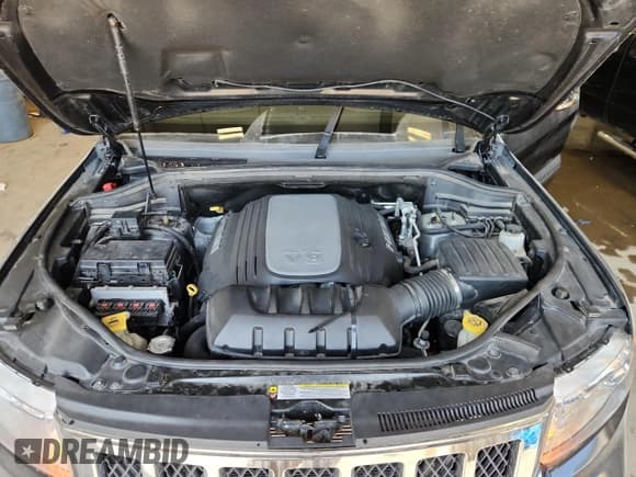 ✅ 2012 Jeep Grand Cherokee Overland • VIN: 1C4RJFCT0CC229116 • Лот: 70897015. Опубликован ранее на Copart с пробегом 173 527 миль. Бесплатный доступ к архиву аукционных продаж из США и подробный отчёт об истории автомобиля на DreamBid. Изображение 12.