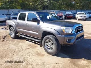 ✅ 2014 Toyota Tacoma PreRunner • VIN: 5TFJU4GN5EX058881 • Lot: 43603920. Listed on IAAI with 170,876 mi. Free auction sales archive from the USA and detailed vehicle history report at DreamBid. Image 1.