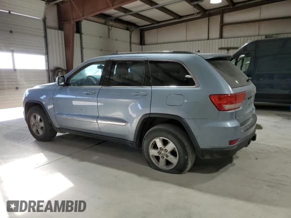 ✅ 2012 Jeep Grand Cherokee Laredo • VIN: 1C4RJFAG0CC341761 • Лот: 92461415. Опубликован ранее на Copart с пробегом 207 996 миль. Бесплатный доступ к архиву аукционных продаж из США и подробный отчёт об истории автомобиля на DreamBid. Изображение 2.