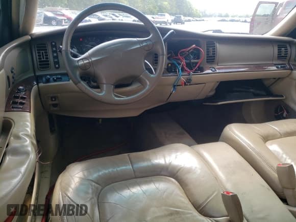 ✅ 2004 Buick Park Avenue • VIN: 1G4CW54K144140136 • Lot: 71315704. Listed on Copart with 215,069 mi. Free auction sales archive from the USA and detailed vehicle history report at DreamBid. Image 8.