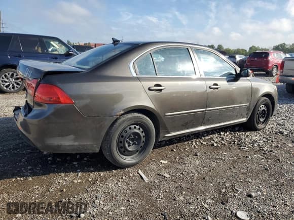 ✅ 2010 Kia Optima LX • VIN: KNAGG4A86A5379903 • Лот: 73708134. Опубликован ранее на Copart с пробегом 173 994 миль. Бесплатный доступ к архиву аукционных продаж из США и подробный отчёт об истории автомобиля на DreamBid. Изображение 3.