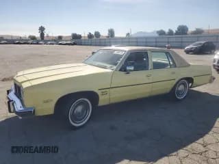 ✅ 1977 Oldsmobile 88 • VIN: 3N69R7C100538 • Лот: 71289175. Опубликован ранее на Copart с пробегом 73 361 миль. Бесплатный доступ к архиву аукционных продаж из США и подробный отчёт об истории автомобиля на DreamBid. Изображение 1.