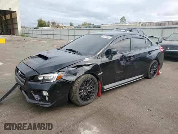 ✅ 2017 Subaru WRX STI • VIN: JF1VA2M64H9830412 • Lot: 84922945. Listed on Copart with 82,938 mi. Free auction sales archive from the USA and detailed vehicle history report at DreamBid. Image 1.