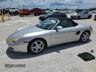 ✅ 1998 Porsche Boxster • VIN: WP0CA2986WU624434 • Lot: 64462864. Listed on Copart with 71,394 mi. Free auction sales archive from the USA and detailed vehicle history report at DreamBid. Image 1.