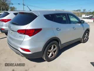 2018 Hyundai Santa Fe 2.4L z VIN 5XYZT3LB5JG563330, wystawiony jako IAAI lot #43397944 z przebiegiem 124 663 mil mil oraz . Historia ofert i sprzedaży dostępna na DreamBid. Obrazek 4.