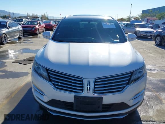 ✅ 2017 Lincoln MKC Select • VIN: 5LMCJ2C98HUL33379 • Lot: 43775018. Listed on IAAI with 79,297 mi. Free auction sales archive from the USA and detailed vehicle history report at DreamBid. Image 12.