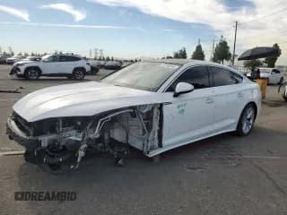 ✅ 2020 Audi A5 Sportback Premium • VIN: WAUANCF57LA005024 • Lot: 87266845. Listed on Copart with 69,104 mi. Free auction sales archive from the USA and detailed vehicle history report at DreamBid. Image 1.