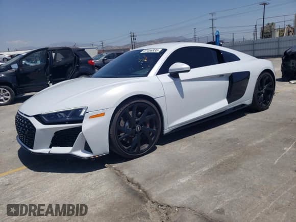 ✅ 2023 Audi R8 performance quattro • VIN: WUACEAFX9P7900103 • Lot: 57456835. Listed on Copart with 5,220 mi. Free auction sales archive from the USA and detailed vehicle history report at DreamBid. Image 1.