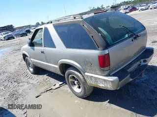 ✅ 2004 Chevrolet Blazer LS • VIN: 1GNCS18X04K112779 • Lot: 41759646. Wystawiony na IAAI z przebiegiem 252 712 mil. Bezpłatny archiwum sprzedaży aukcyjnych z USA i szczegółowy raport historii pojazdu na DreamBid. Zdjęcie 3.