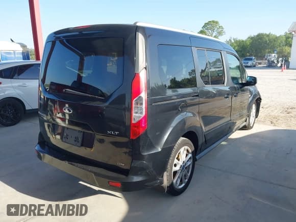 ✅ 2014 Ford Transit Connect XLT • VIN: NM0GE9F76E1164294 • Lot: 42261397. Listed on IAAI with 129,812 mi. Free auction sales archive from the USA and detailed vehicle history report at DreamBid. Image 4.