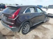 ✅ 2021 Cadillac XT4 FWD Premium Luxury • VIN: 1GYFZCR48MF002387 • Лот: 42752132. Опубликован ранее на IAAI с пробегом 106 859 миль. Бесплатный доступ к архиву аукционных продаж из США и подробный отчёт об истории автомобиля на DreamBid. Изображение 4.