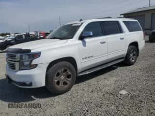 2015 Chevrolet Suburban LTZ z VIN 1GNSKKKC6FR262798, wystawiony jako Copart lot #62321285 z przebiegiem 159 294 mil mil oraz Szkoda całkowita • Salvage title. Historia ofert i sprzedaży dostępna na DreamBid. Obrazek 1.
