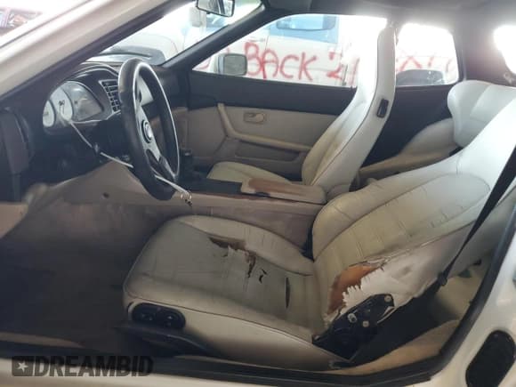 ✅ 1987 Porsche 944 • VIN: WP0AB0948HN472823 • Лот: 70503855. Опубликован ранее на Copart с пробегом 142 361 миль. Бесплатный доступ к архиву аукционных продаж из США и подробный отчёт об истории автомобиля на DreamBid. Изображение 7.