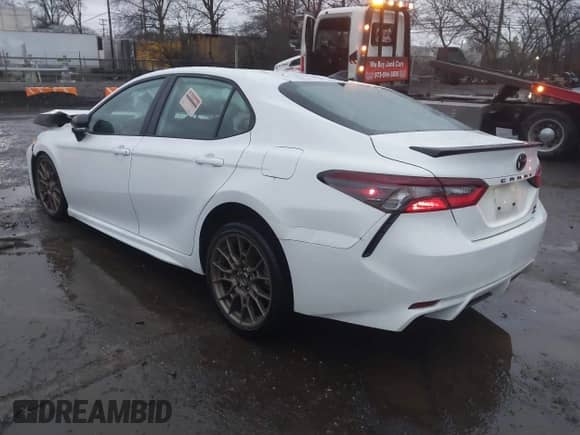 2023 Toyota Camry SE with VIN 4T1G11BK4PU094043, listed as a IAAI auction lot 41083305 with 25,698 mi miles and . Bid and sale history available at DreamBid. Image 3.