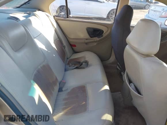 ✅ 2003 Chevrolet Malibu LS • VIN: 1G1NE52J13M638564 • Lot: 43619736. Wystawiony na IAAI z przebiegiem 130 455 mil. Bezpłatny archiwum sprzedaży aukcyjnych z USA i szczegółowy raport historii pojazdu na DreamBid. Zdjęcie 8.