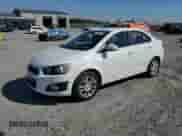2014 Chevrolet Sonic LT с VIN 1G1JC5SH6E4233207, выставлен на аукционе Copart как лот 84608365 с пробегом 138 210 миль миль и Списание • Salvage title. История ставок и продаж доступна на DreamBid. Изображение 1.