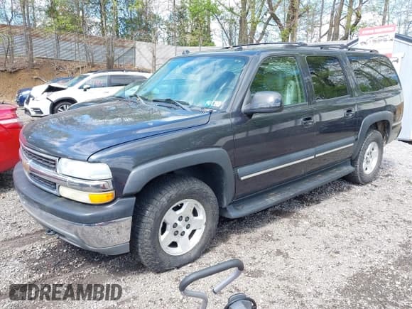 ✅ 2004 Chevrolet Suburban LS • VIN: 1GNFK16Z04J164064 • Lot: 42203864. Listed on IAAI with 215,709 mi. Free auction sales archive from the USA and detailed vehicle history report at DreamBid. Image 2.